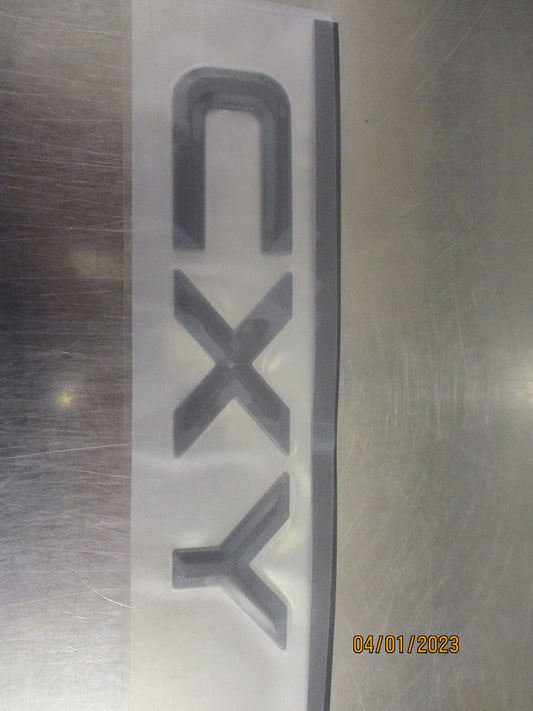 Isuzu Giga CXY Prime Mover Genuine Black CXY Cab Emblem New Part