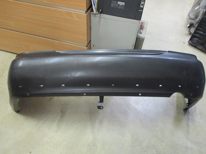 Mitsubishi Lancer CE Sedan Genuine Rear Bumper Bar Cover New Part