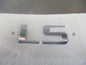 Holden TJ Trax Genuine 'LS' Chrome Tailgate Badge New Part