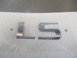 Holden TJ Trax Genuine 'LS' Chrome Tailgate Badge New Part