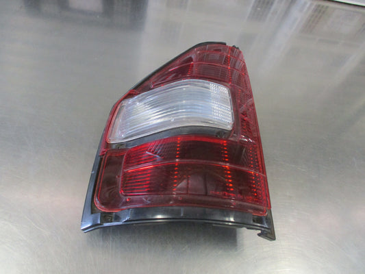 Mitsubishi Pajero Genuine Left Hand Tail Light New Part Slightly Cracked