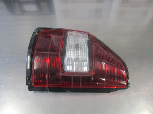 Mitsubishi Pajero Genuine Left Hand Tail Light New Part Slightly Cracked