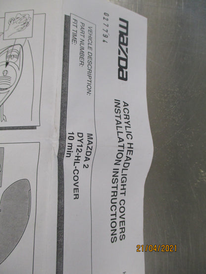 Mazda 2 Genuine Front Pair Of Headlight Protectors New Part