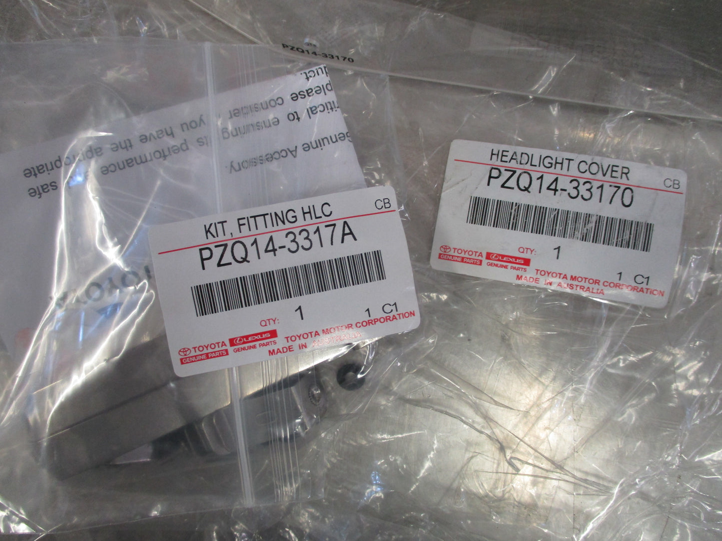 Toyota Camry SL SX Genuine Headlight Cover Set New Part
